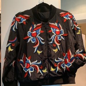 Black multi embroidered bomber jacket.